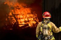 Firefighters Lieutenant observing the practice fire 