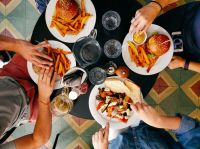 Food Restaurant Friends eating lunch in diner 
