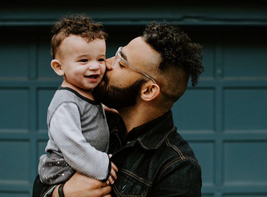 Family dispute Father holding his baby boy with matching haircut family,people,father