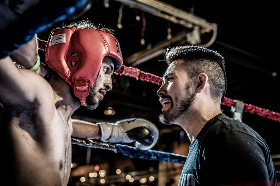 MMA My friend Mo was fighting so he invited me to come along. I took this picture of his coach and him in-between rounds. Mo ended up winning the fight in a unanimous decision by the referee.