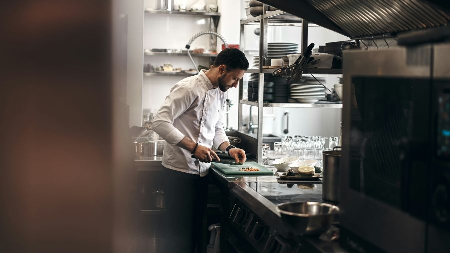 Chef restaurant A chef dressed in a white coat working in a kitchen. 
@novokayn on Instagram 