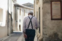 pension The back of the old man walking in the street 
