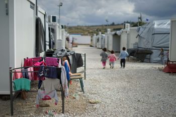 Migrant camp Syrian refugee camp in the outskirts of Athens. Over 6.6 million Syrians were forced to flee their home since 2011. Many are still stranded in refugee camps in Turkey and Greece, waiting (and hoping) to be granted asylum in European countries or beyond. According to the United Nations Universal Declaration of Human Rights of 1948, everyone has the right to seek and to enjoy in other countries asylum from persecution. In practice, despite the existence of well-founded fear of persecution, many