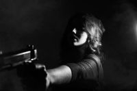 Threat Violence  woman,gun,dark