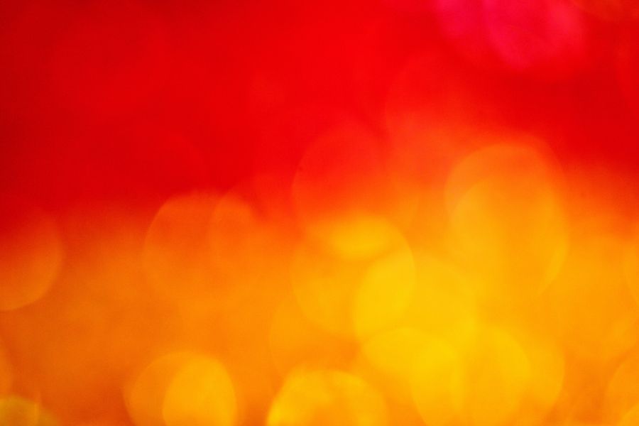 Heat Warm red and orange bokeh fire background wallpaper.
