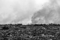 Dumping site Pollution concept, Burning garbage pile in trash dump or landfill, black and white photo grey,nature,outdoors