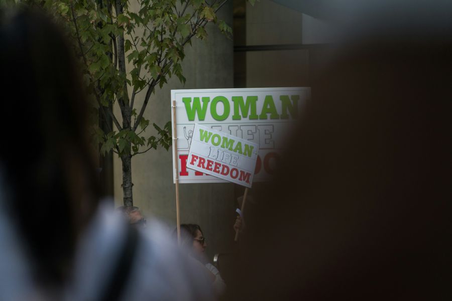 Protest march Mahsa Amini Protests in Downtown Vancouver woman rights,freedom,rally cars