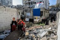 Gaza conflict Gaza - Palestine Children among the rubble of their house 