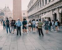 tour guide Tourist group on Piazza San Marco 
