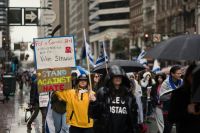 Antisemitism At the Unity Rally, a march against antisemitism held in San Francisco, an activist holds up a sign stating 