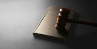 Euthanasia law judge gavel on black background with space for text. law concept 