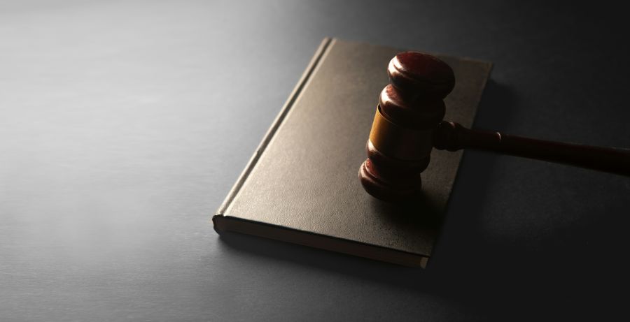 Euthanasia law judge gavel on black background with space for text. law concept 