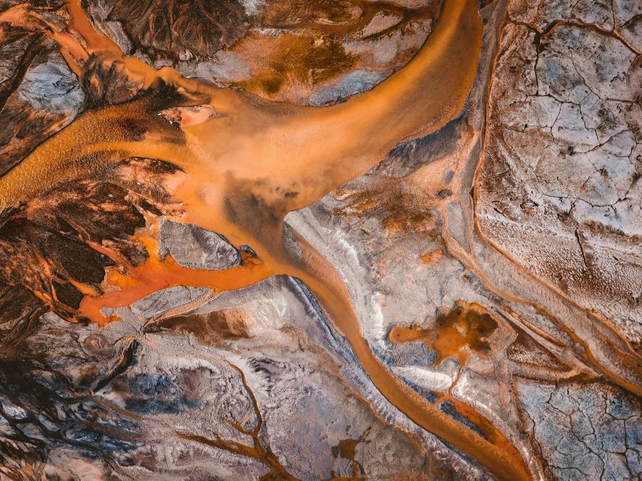 pollutants Orange sludge texture,river,mud