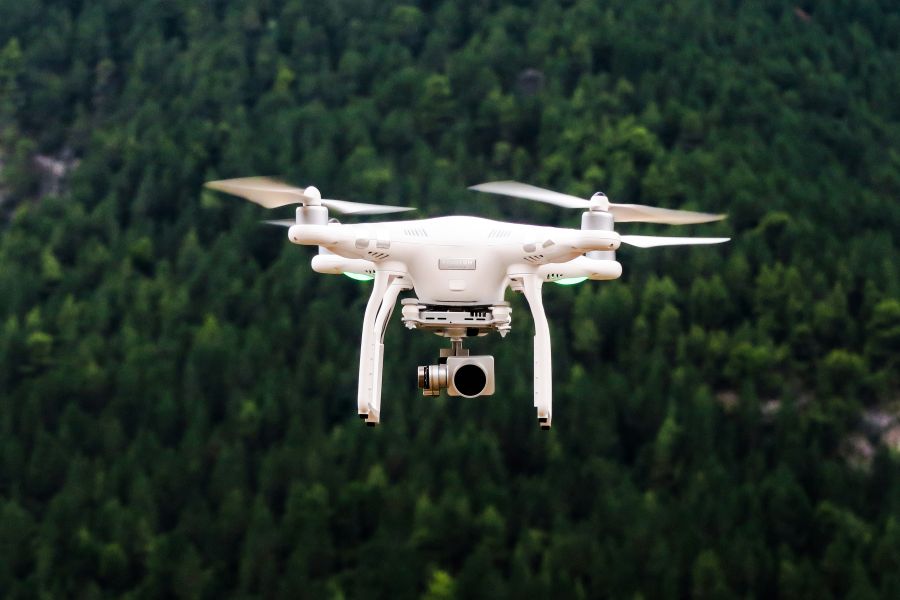 Drone White drone mid-flight