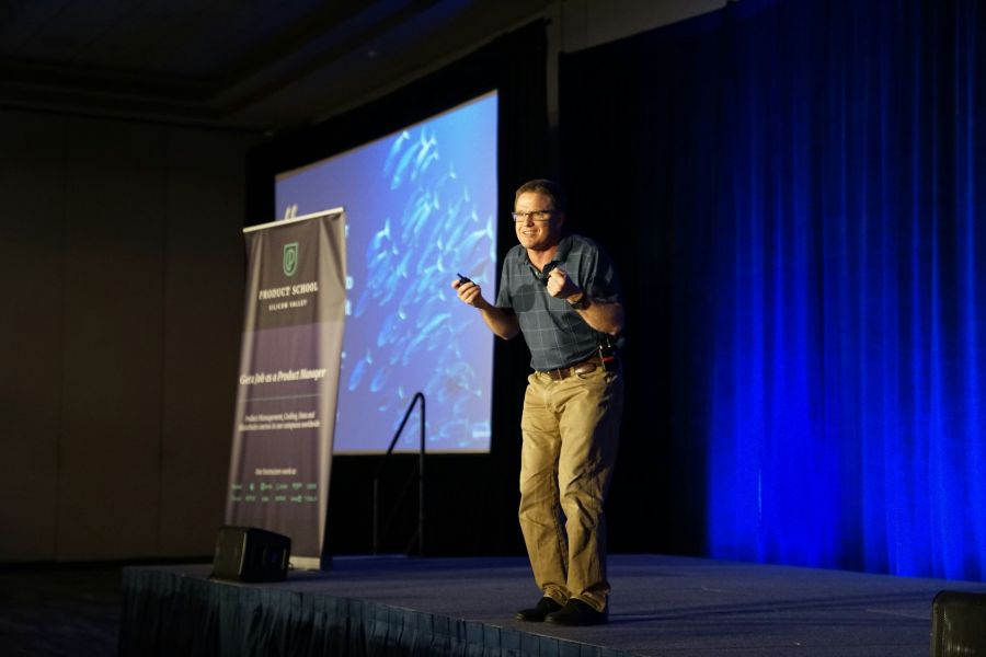 Speech Man speaking on stage for a presentation during a conference  