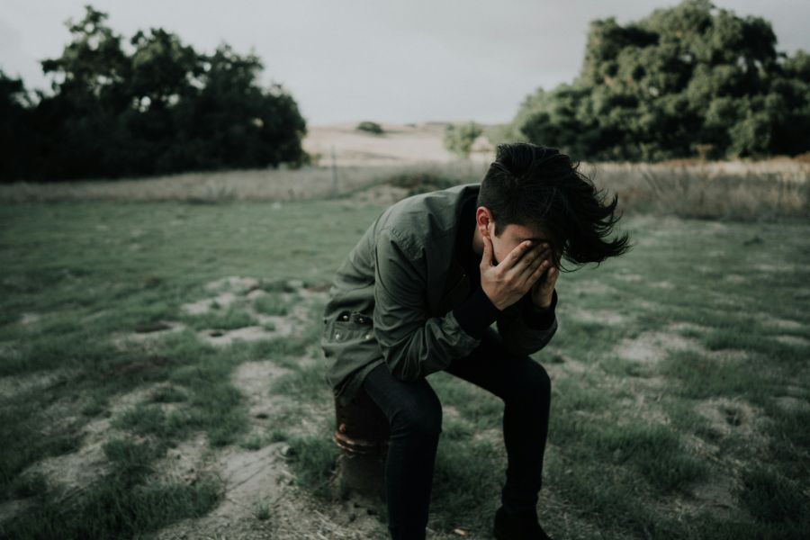 sadness Face in Hands