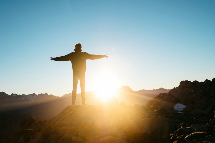 freedom At 5.30am we stand at the top of the hill in the Mt Cook national park in New Zealand to celebrate that awesome sunrise.
The photo was taken with the self-timer. 