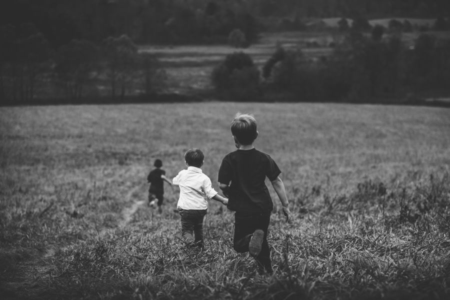 Childhood Throughout my childhood, my family would take annual trips from our home in Indianapolis down to Gatlinburg, TN and the Smoky Mountains. After a long break, we’ve started this tradition anew. This photo was shot while my son (in white) and two of my nephews took off into a Cades Cove meadow at full sprint. It was a completely spontaneous moment that turned into an unforgettable image.