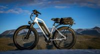 Electric bikes Blue sky, white e-bike mountain bike,park cycling,visible in night