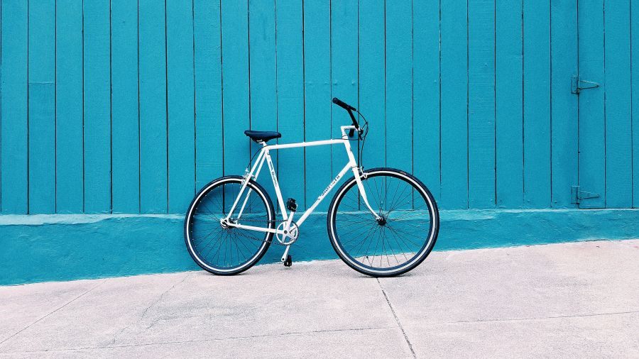 bicycle Teal wall in the sunset. 
