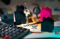 rental prices Real estate market finance calculator. Home heys on banknotes documents agreement. 
