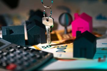 rental prices Real estate market finance calculator. Home heys on banknotes documents agreement. 