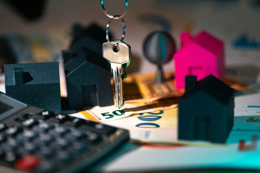 rental prices Real estate market finance calculator. Home heys on banknotes documents agreement. 