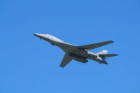 Defense B-1 in flight at an airshow. 