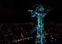 Telepherique cable The cable car of the Bastille fort (in France). The pillar indicates the state of pollution of the city of Grenoble according to the color. fort de la bastille,quai stéphane jay,night