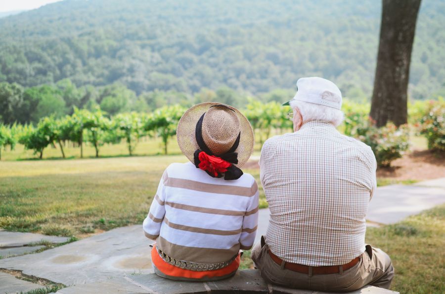 Seniors Grandparents enjoying the view at the grandsons wedding 