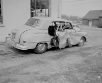 Car crash Bob Amos. Auto P82029. 81 Bridge St., Dedham, accident - crushed - collision, 1956

https://ark.digitalcommonwealth.org/ark:/50959/r494vt896

Please visit Digital Commonwealth to view more images: https://www.digitalcommonwealth.org.

  vintage car,old photography,broken car