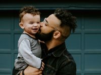 Grandparents Family Father holding his baby boy with matching haircut love,baby kiss,father and son