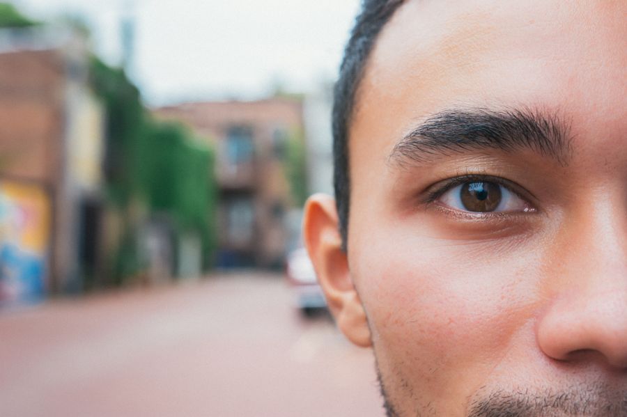 Contacts Affaire Bronw eye close up with street contacts,man eye,man face close up