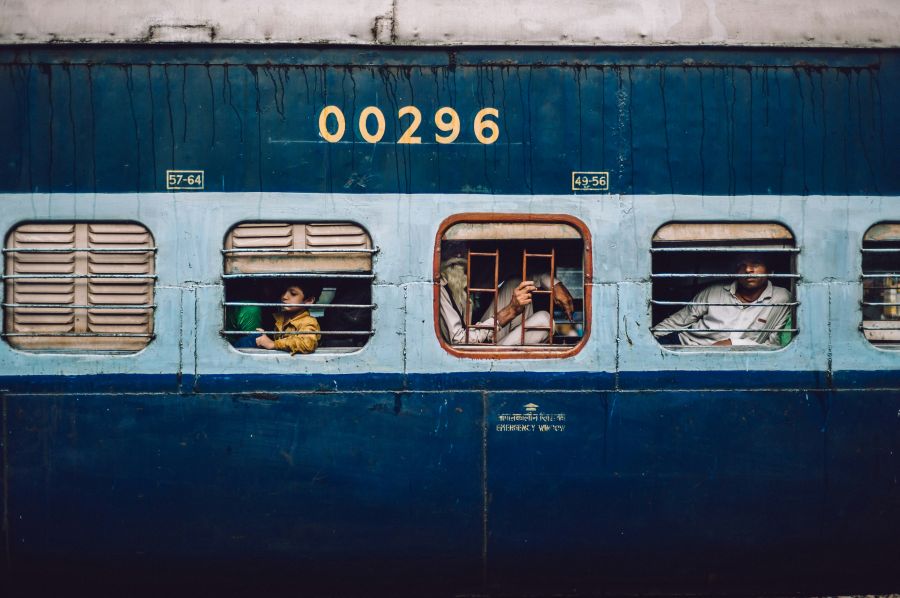 Train passenger Not pictured are the clickety clacks of metal, the yells, whistling air, announcements far too loud for the speakers and wheeled trolleys on tiles. 

And pictured is a train pulling into the Hazrat Nizamuddin railway station. Along with it comes the weary travellers and riders looking out of their gated compartments. Some are too tired even to peer out, keeping their windows closed. 