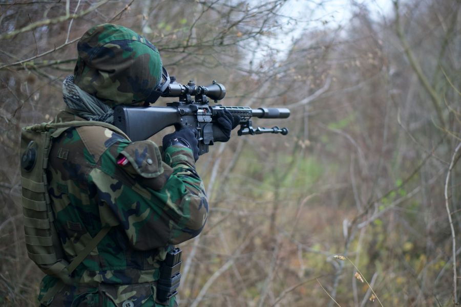shooting gun person,weapon,forest