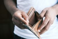 Bankruptcy Man hand open an empty wallet with copy space human,spending,money