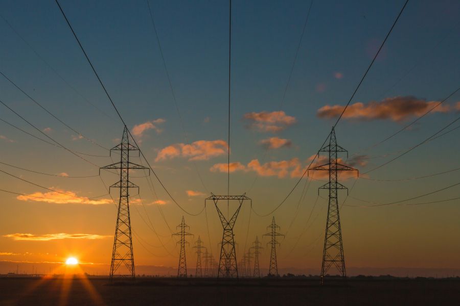 Energy dependence Power pylons at sunset energy,power,electricity