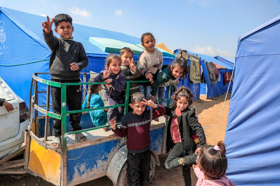 Children Gaza Gaza - Palestine Children smile despite the suffering they experience every minute from the heat, lack of water, tents and diseases in a camp for displaced people in the northern Gaza Strip. 