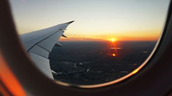 Airplane Travel Sunset seen from a plane