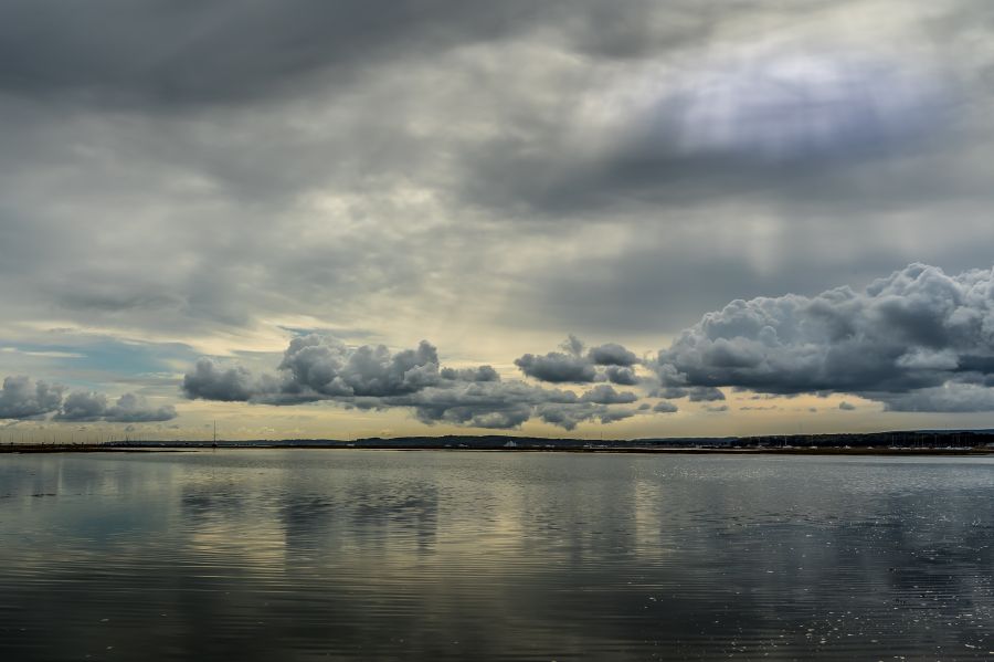 Rain Clouds Low clouds over a still sea. uk,milford on sea,nature