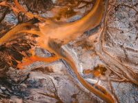 Contamination toxins Orange sludge texture,mud,river