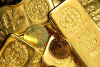 gold bars Pile of gold bullion coins and bars. Argor Heraeus, Münze Österreich and Krugerrand. If you use our photos, please add credit to https://zlataky.cz, when possible 