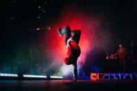 Dance Performance This was taken at Immerse, in Orlando, Florida. This crew had a bunch of epic moves and movements and this one was taken just in time. 