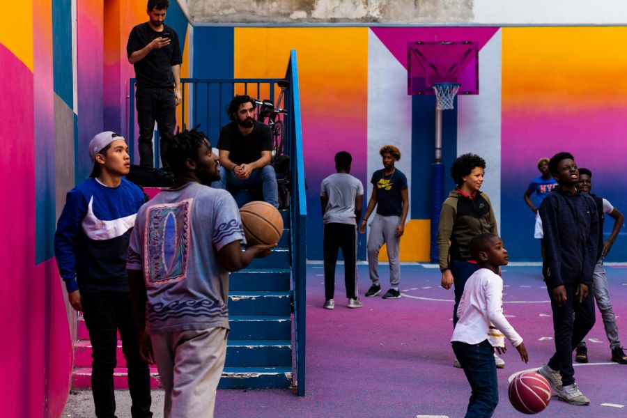 Players Colorful photo taken during a basketball game in Playground Duperré, in Paris. paris,france,playground duperré