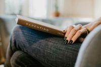 Parenting Parenting book on a woman's lap 